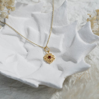 Dara Knot Garnet Pendant Necklace